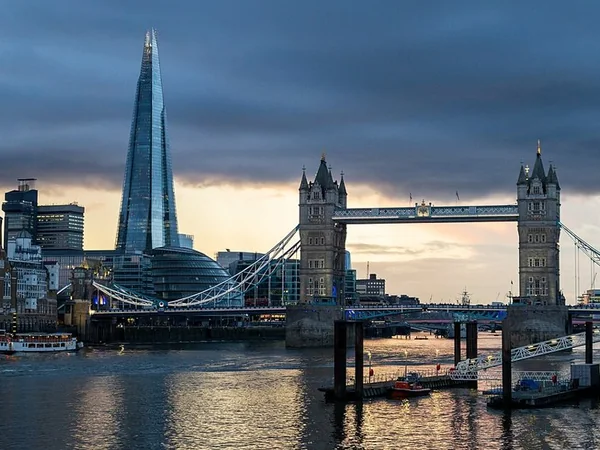 The Shard and Tower Bridge above the Thames at sunset